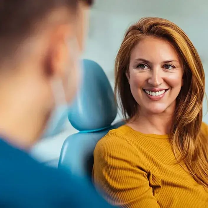 female-at-dentist-705x705