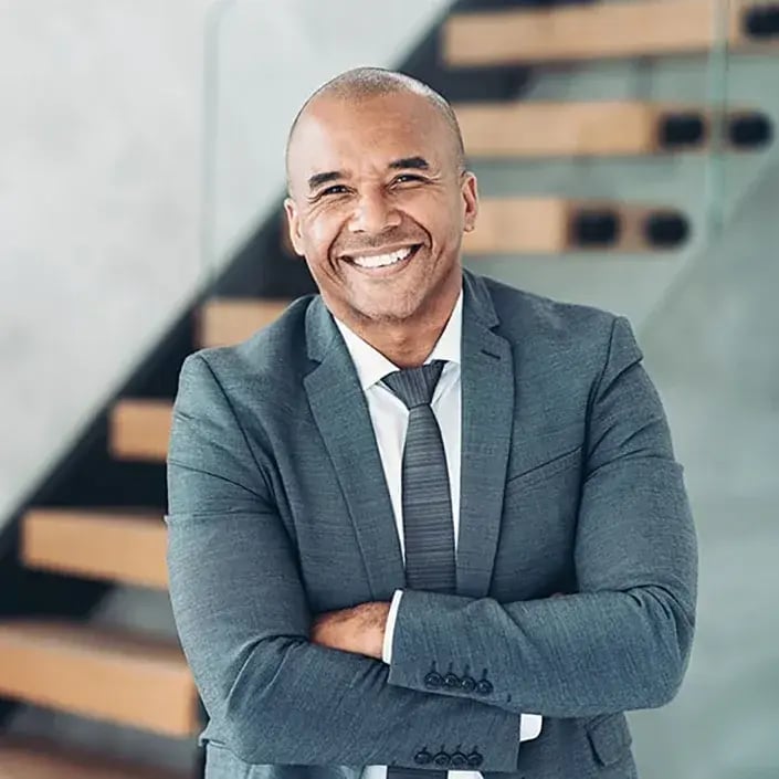 smiling-business-man-705x705